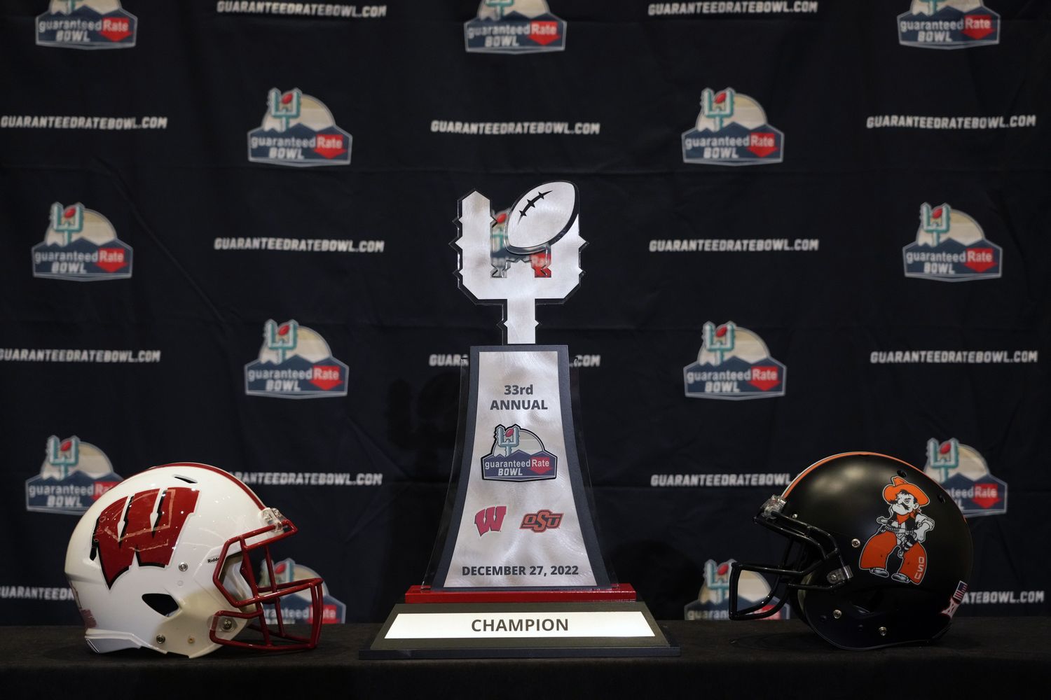 The trophy for the Guaranteed Rate Bowl between Wisconsin and Oklahoma State.